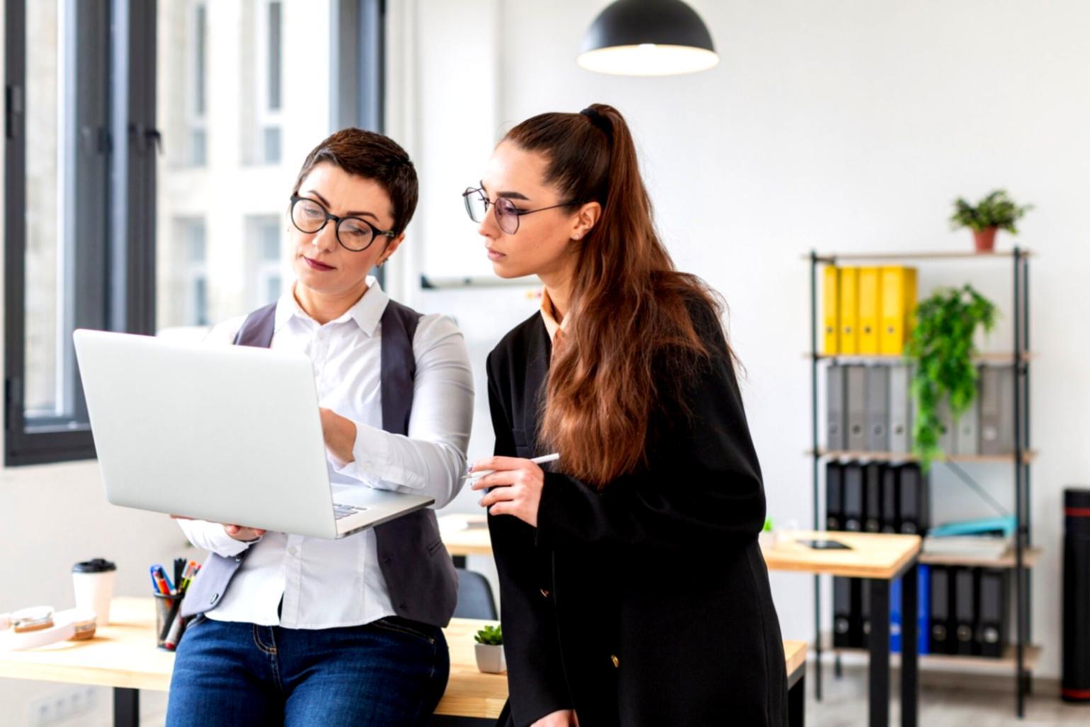Financial documents and planning materials organized on a workspace